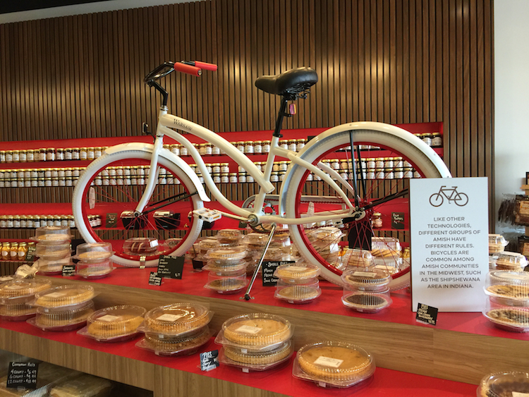 Displays at Rise 'n Roll Bakery teach customers about aspects of Amish culture, like biking.