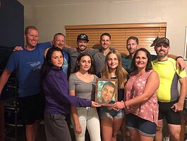 Drew Shipley, center, surrounded by his family and friends who created the Andrew Shipley Memorial Ride.