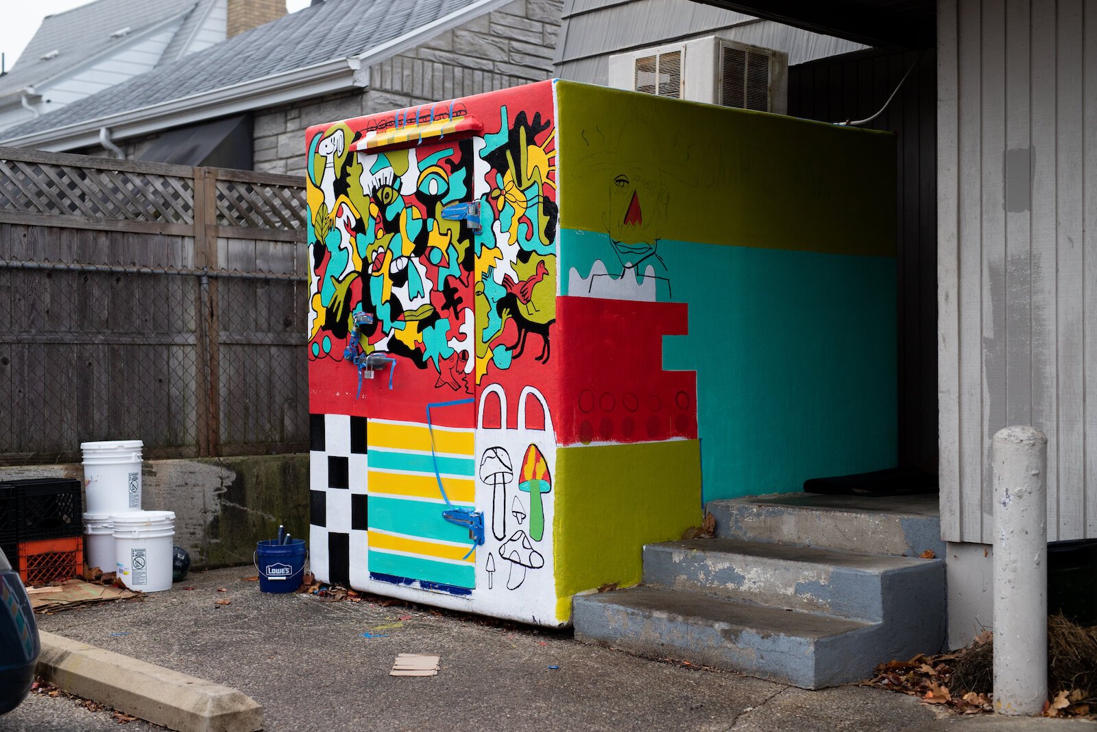 A mural by Fort Wayne artist Tyler Toole on a large cooler behind Chance Bar.