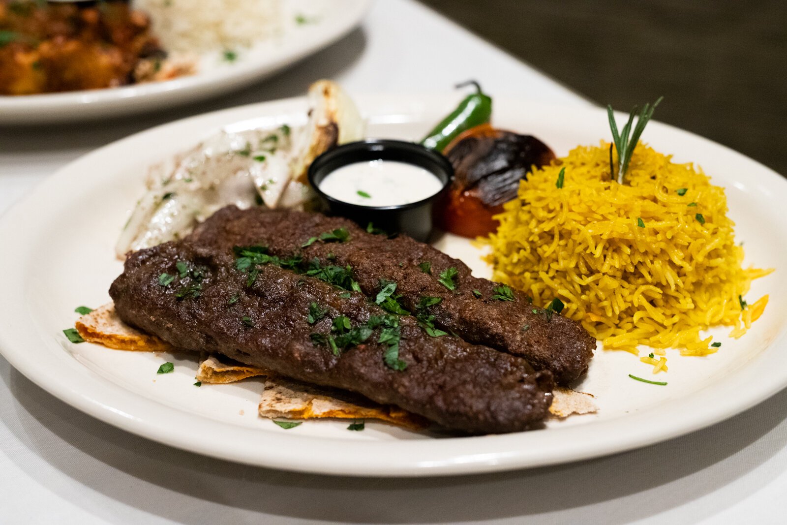 The Adana Beef Kebab is incredibly savory, tender, and well-spiced. It plays nicely with the nutty, slightly bitter tahini sauce it’s served with.