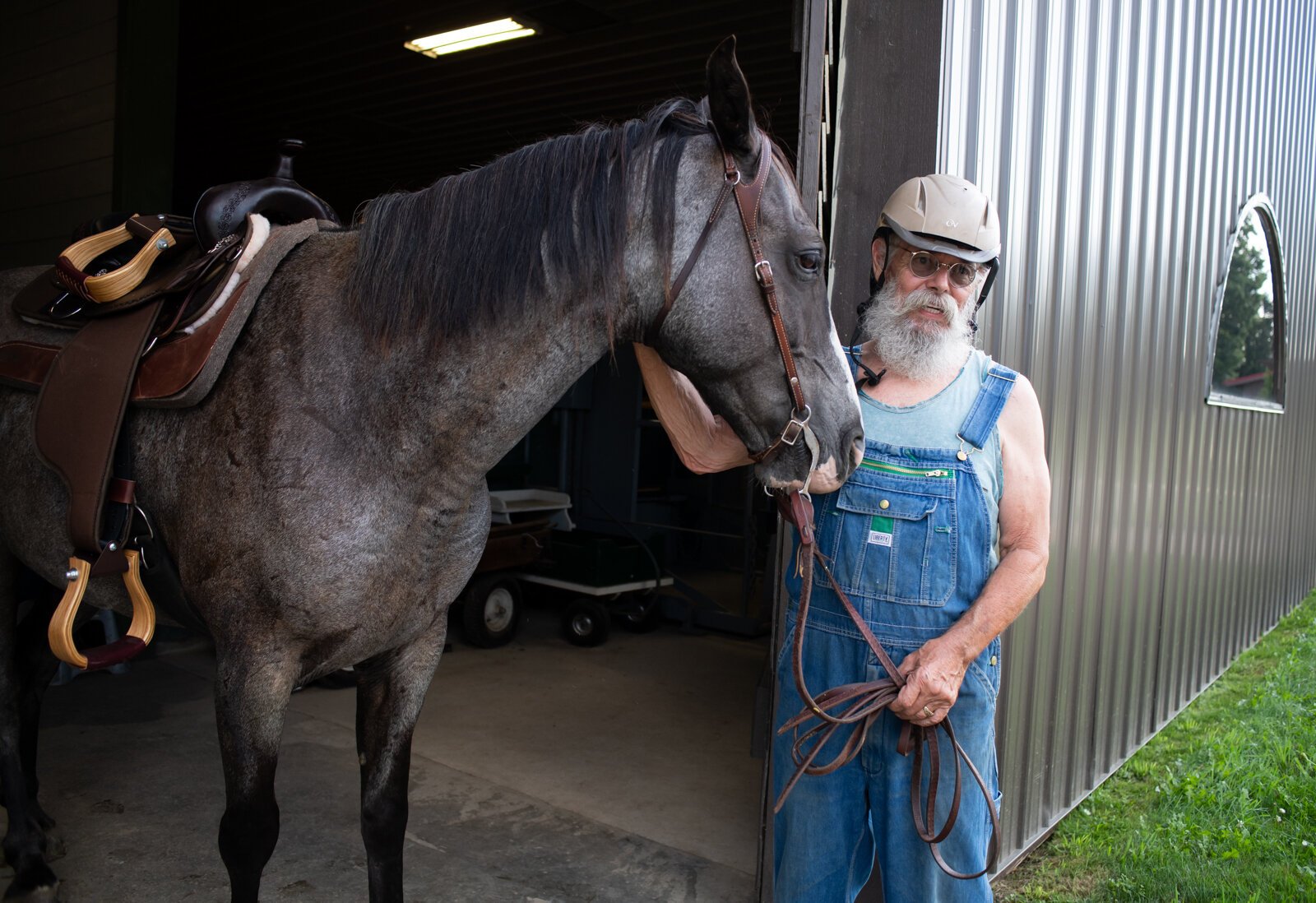 Veteran Randal Clemens with horse Mojo at Summit Equestrian Center, 10808 La Cabreah Ln.