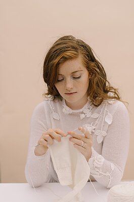 Esther Andrews, a Millennial fashion entrepreneur based in Fort Wayne, is the visionary behind Esther Andrews Bridal, a forthcoming line of sustainable winter knitwear for brides.