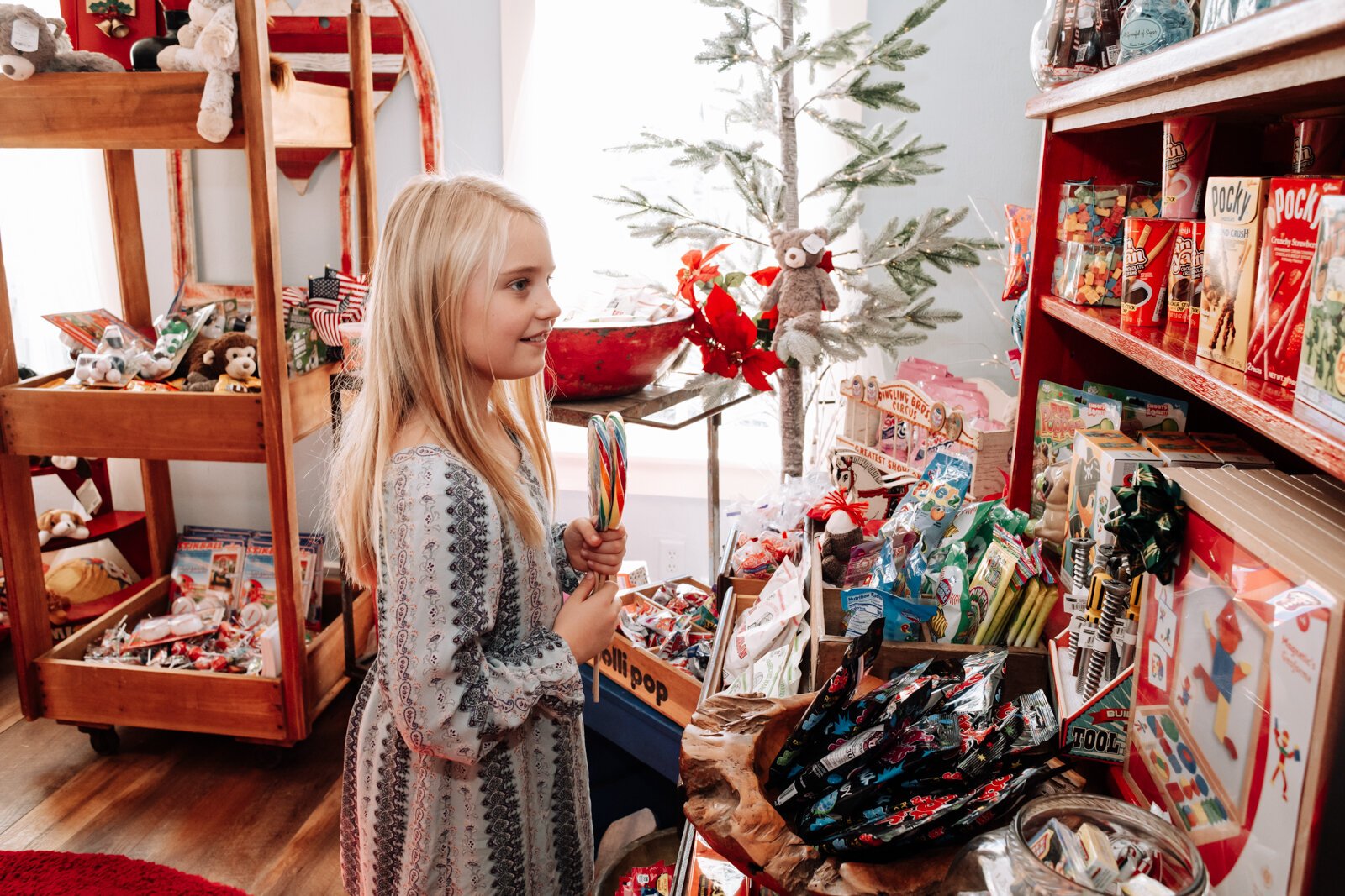  Finley Wretling, 9, looks for presents for friends and parents at Spoonful of Sugar in Roanoke.