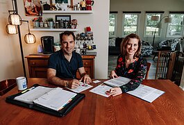 Irene Paxia, right, and her husband, Andrew Applegate, run the consulting firm Petra Solutions from their home, helping companies improve cross-cultural, fundraising, and business strategies.
