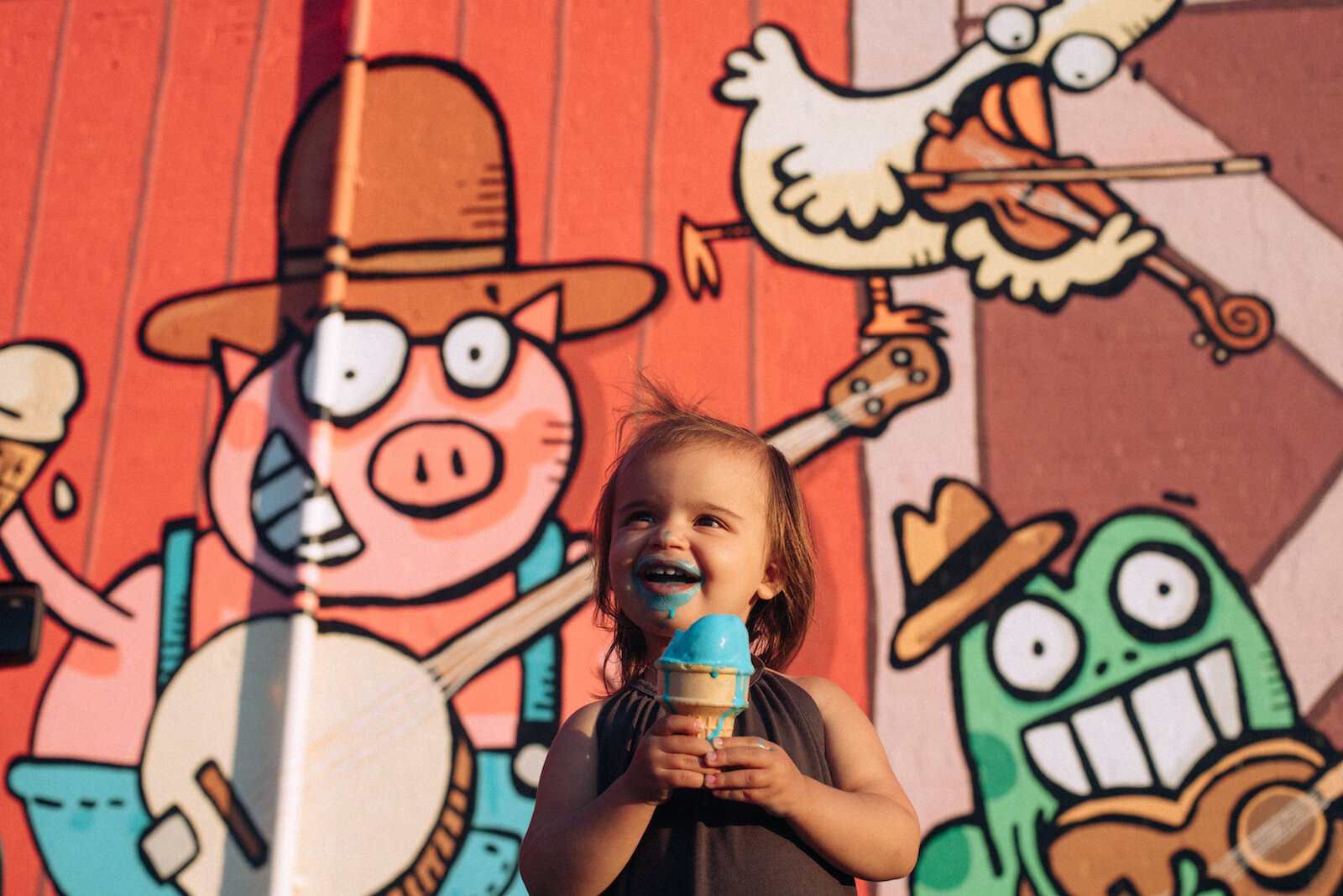 The Ice Cream Vault on Main Street in Andrews features a mural of a Farmyard Hoedown by Bryan Ballinger.