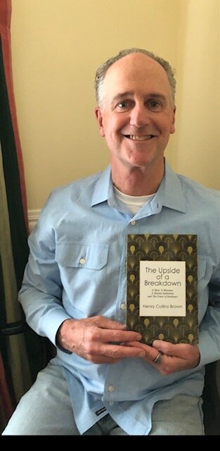 Tim Brown with his book, "The Upside of a Breakdown – A Man, A Museum, A Mental Institution and the Power of Resilience."