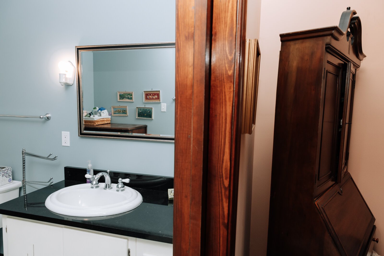 The bathroom in Amy Beatty's accessory dwelling unit that was added on in 2012 to accommodate her mother. The bathroom is equipped with a roll in shower. 