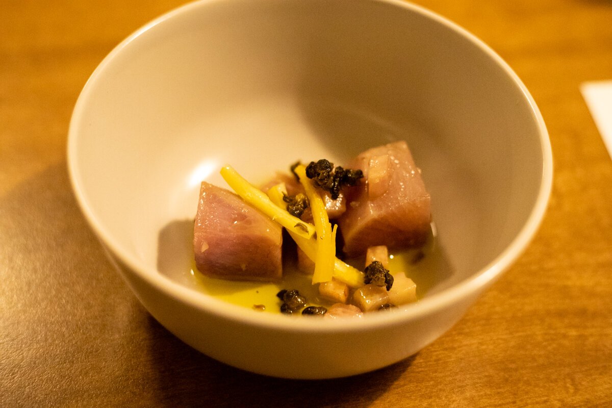 The second course stars an ultra-decadent daikon, which resembles a confit served in a small pool of oil.