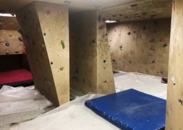 The rock climbing gym at Earth Adventures helps people train for outdoor excursions.