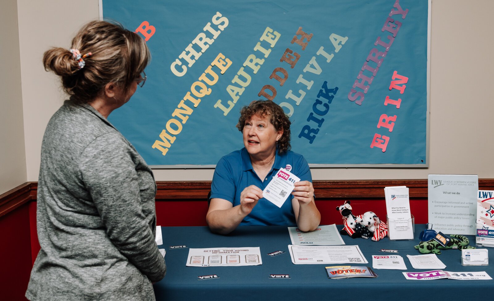 Items on a voting information table set up by Betsy Kachmar, Co-President of League of Women Voters of Fort Wayne at the Allen County Public Library Tecumseh branch. Kachmar's team has set up similar tables in 40 locations in the last month. 