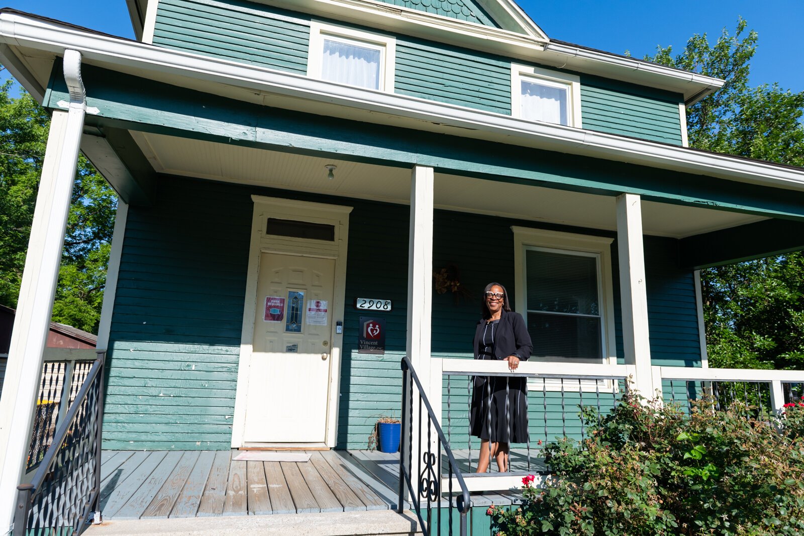 Sharon Tucker, Executive Director of Vincent Village, in front of the building used for COVID-19 relief.