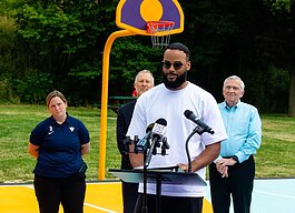 Andre Portee is the Fort Wayne artist and creator of AbsorbALL, renovating basketball courts at local parks into playable murals.