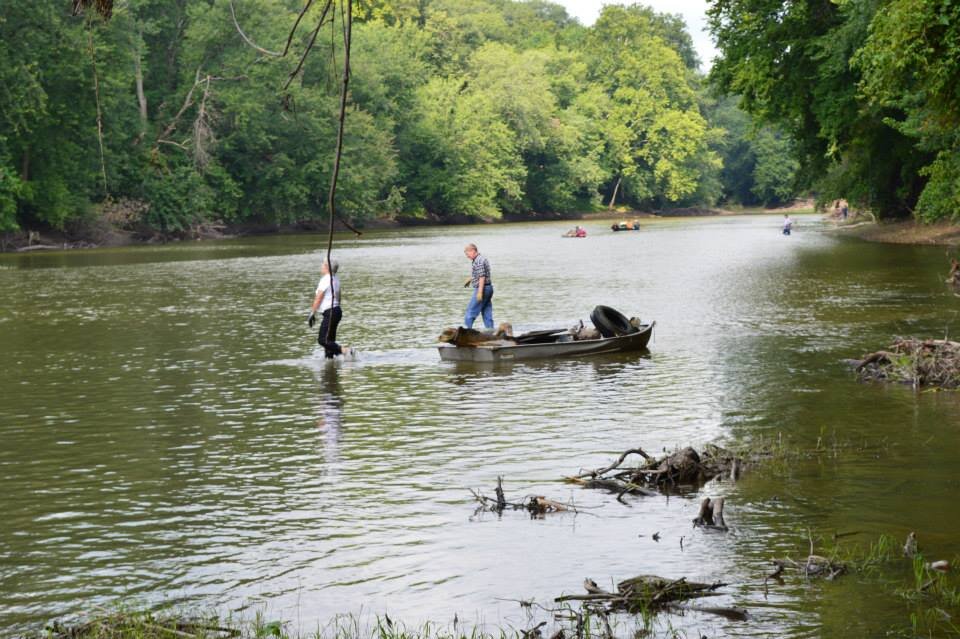 Volunteers in the Wabash River for Clean Out the Banks.