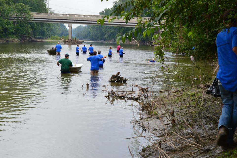Volunteers in the Wabash River for Clean Out the Banks.