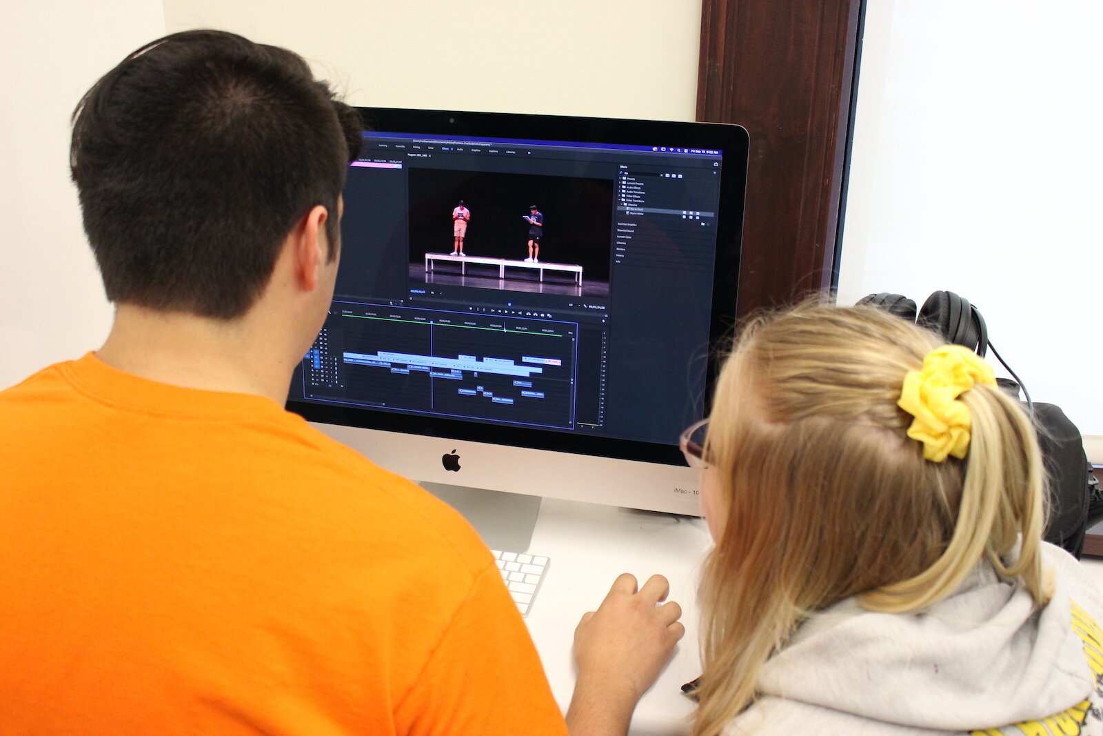 Second-year students Brenden Rowan and Layla Durocher edit a video project.