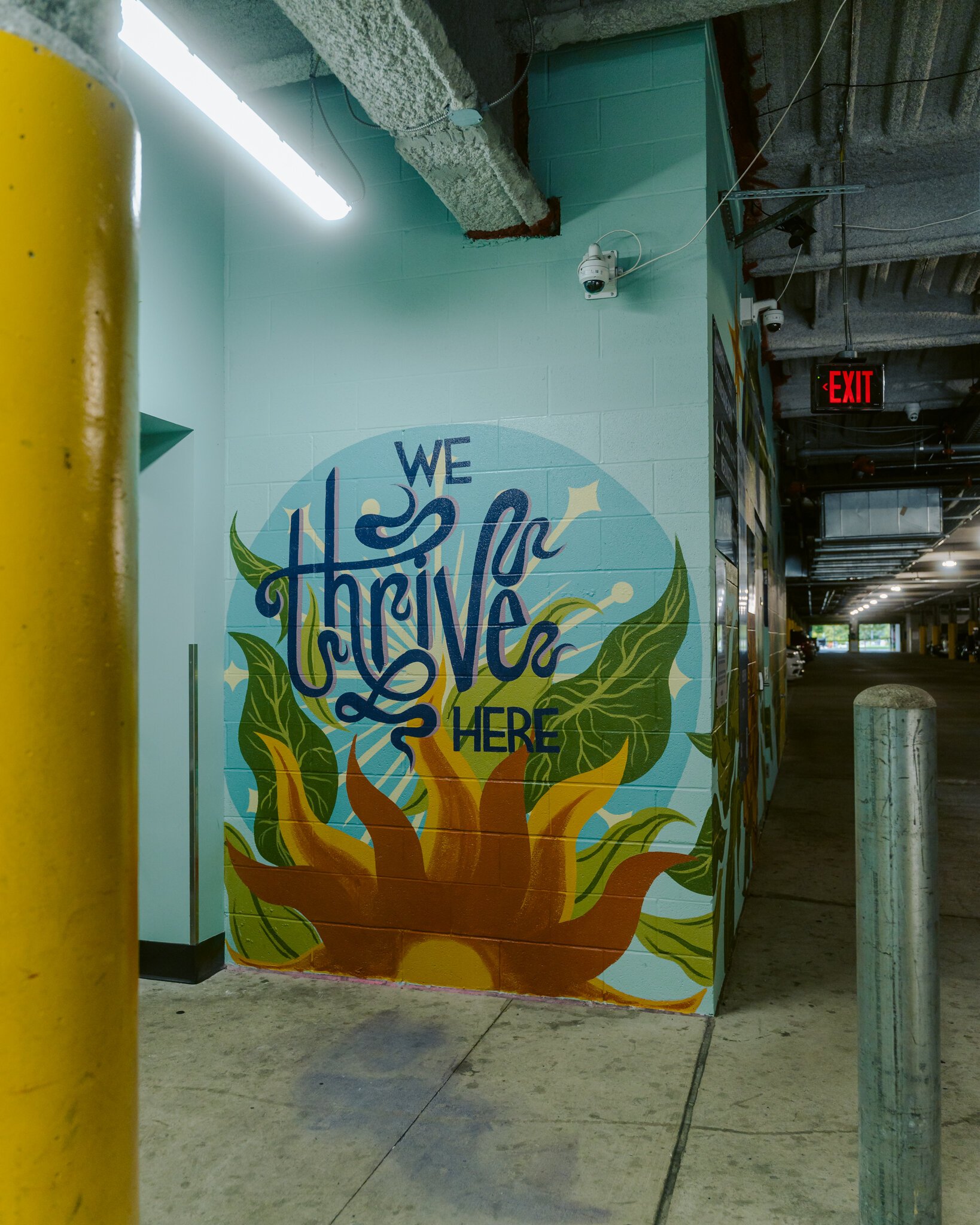 “We Thrive Here” by Julie Wall in The Riverfront at Promenade Park's parking garage.
