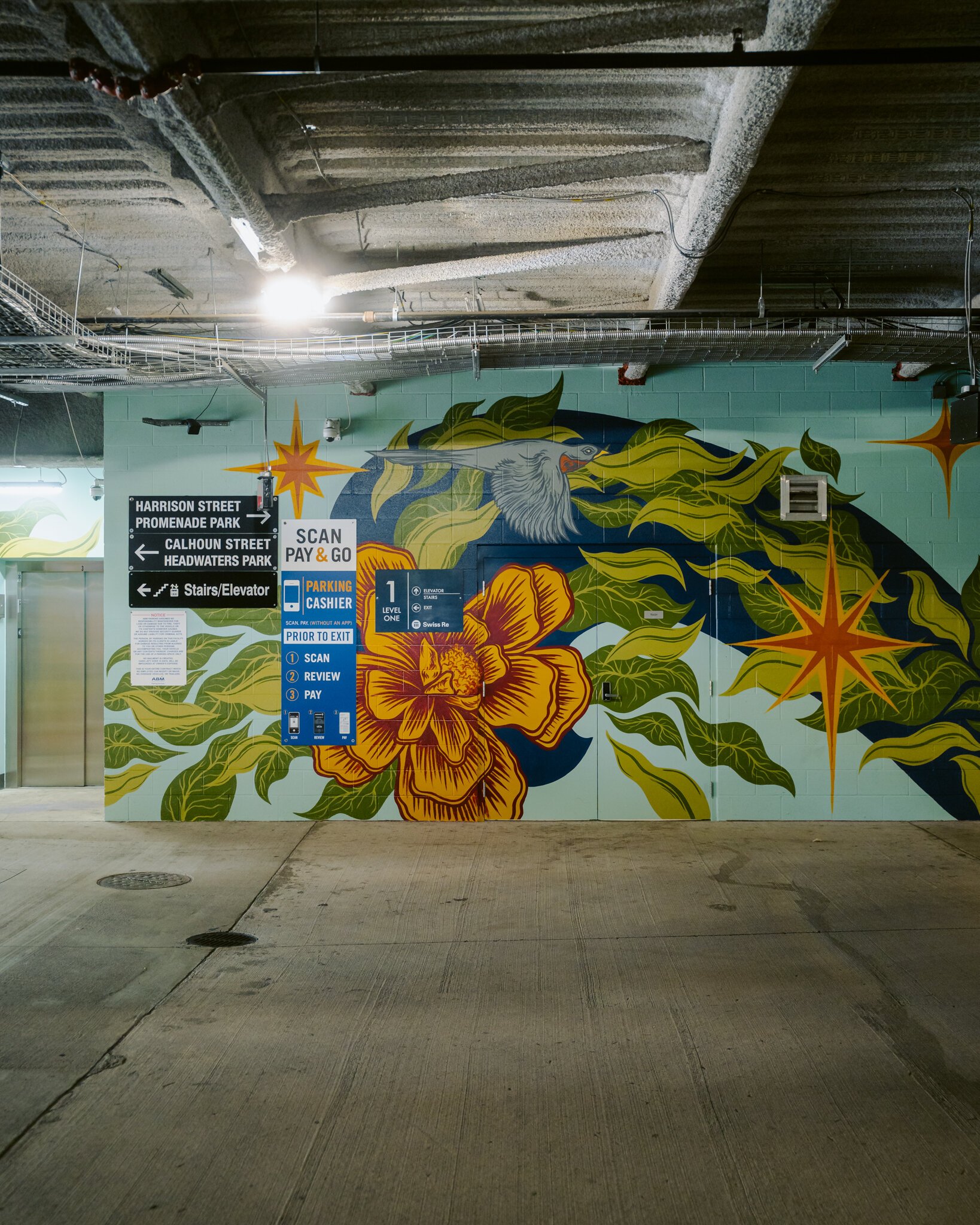 “We Thrive Here” by Julie Wall in The Riverfront at Promenade Park's parking garage.