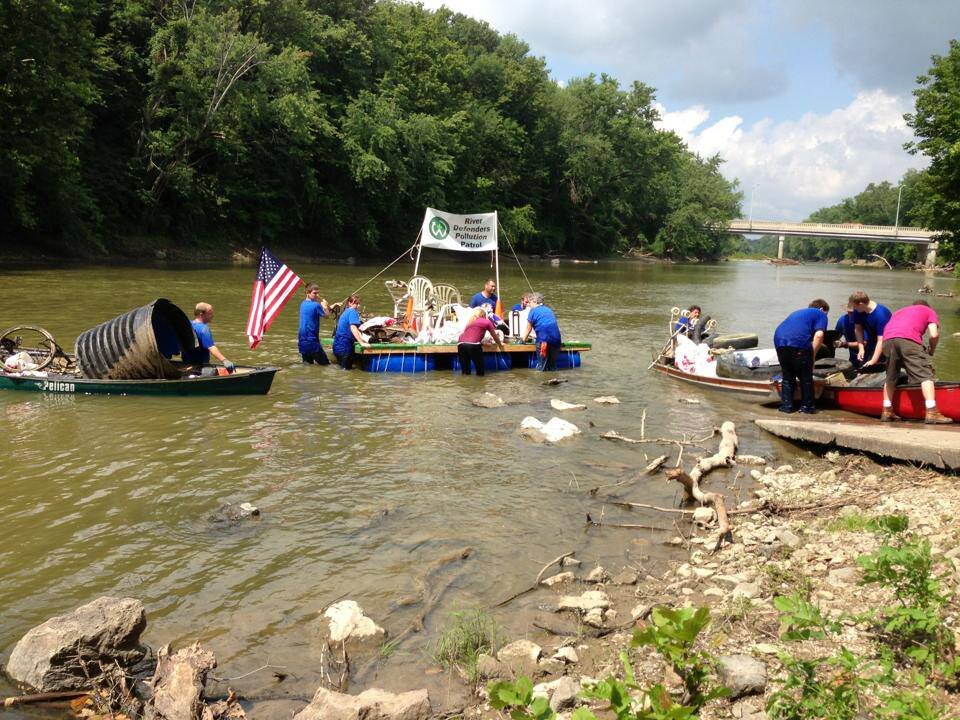 Volunteers in the Wabash River for Clean Out the Banks.