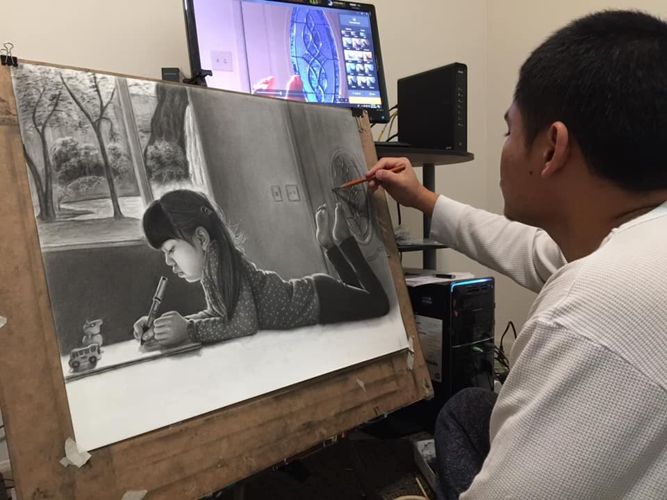 Parkview Police Officer Htoo Doh works on an art piece.