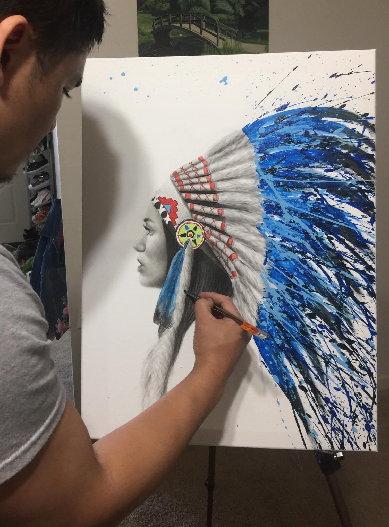 Parkview Police Officer Htoo Doh works on an art piece.