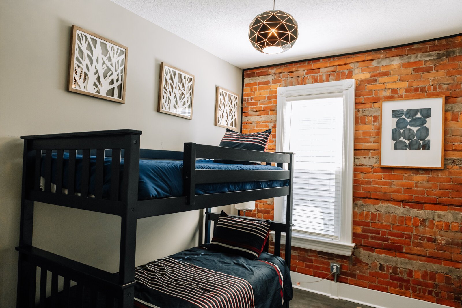 Bunk beds in one of the bedrooms on the bottom floor.