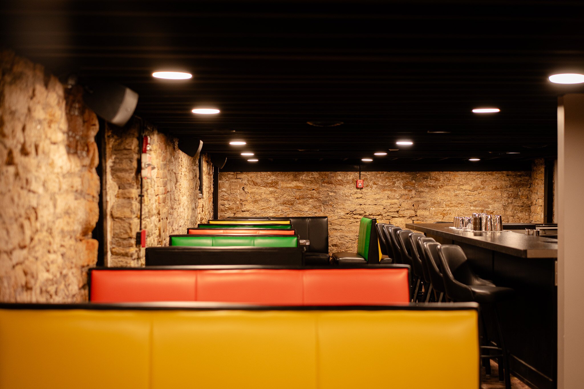 Colorful booths line the walls inside Night Train.