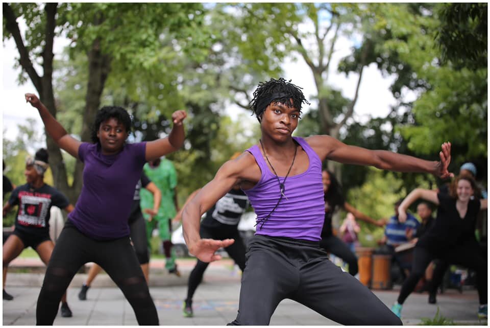 African dancers perform at a pop-up event in Bloomington in 2019 designed to restore cultural memory about a Black marketplace that was firebombed by the KKK.