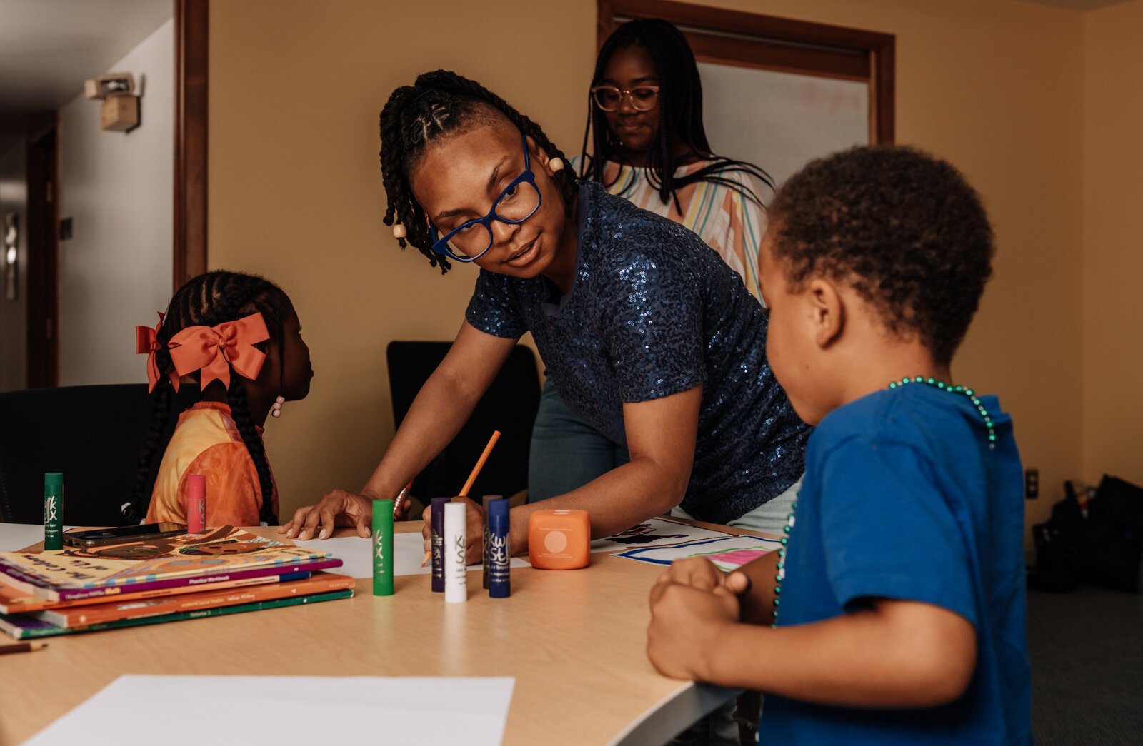 Alle Wims of Brain Geeks Learn educational services works with students during a private tutoring session at PENTA Center, 2513 S. Calhoun St.