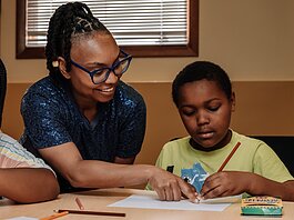 Alle Wims of Brain Geeks Learn educational services works with her student Charles during a private tutoring session at PENTA Center, 2513 S. Calhoun St.
