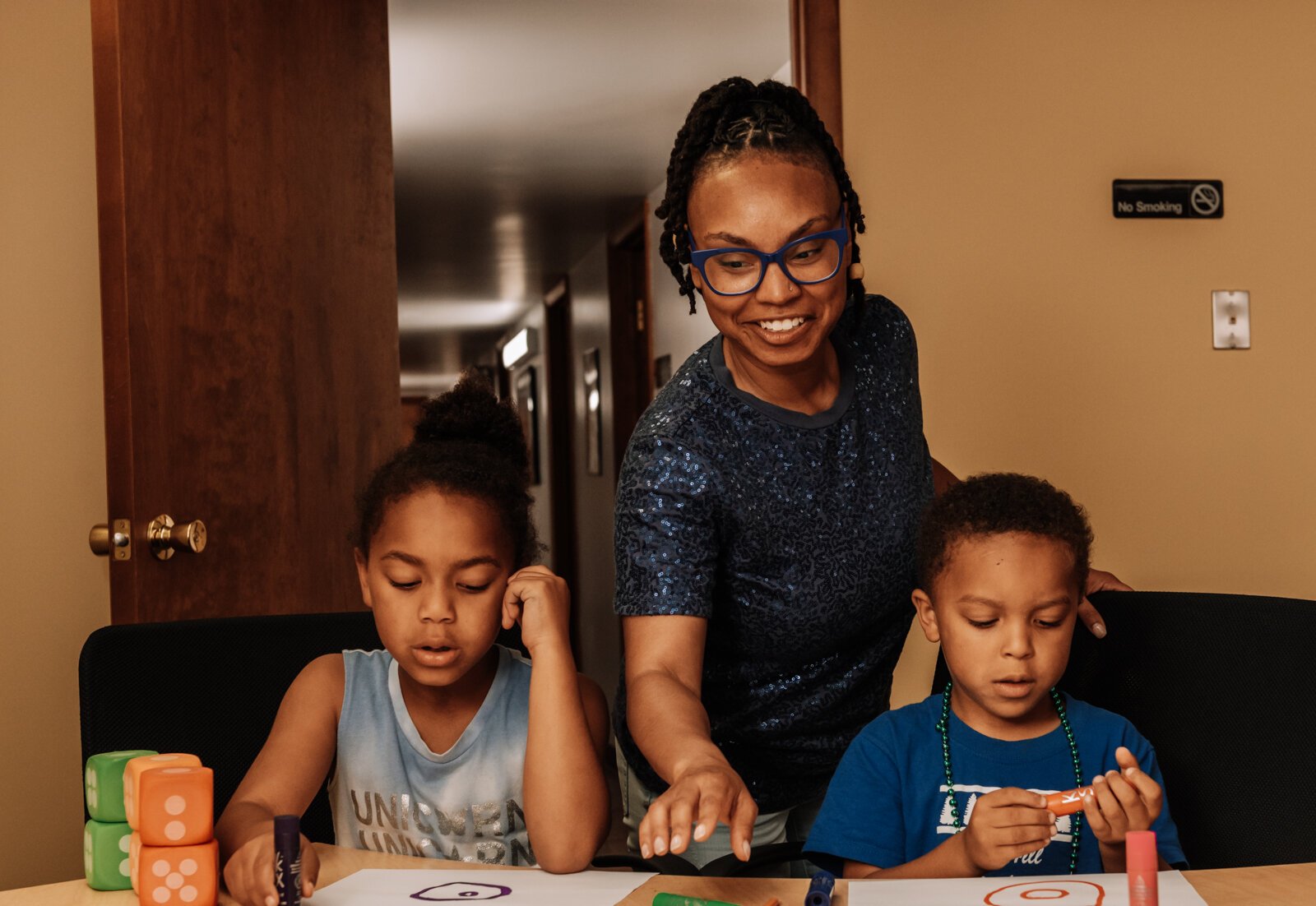 Alle Wims of Brain Geeks Learn educational services works with her student Charles during a private tutoring session at PENTA Center, 2513 S. Calhoun St.