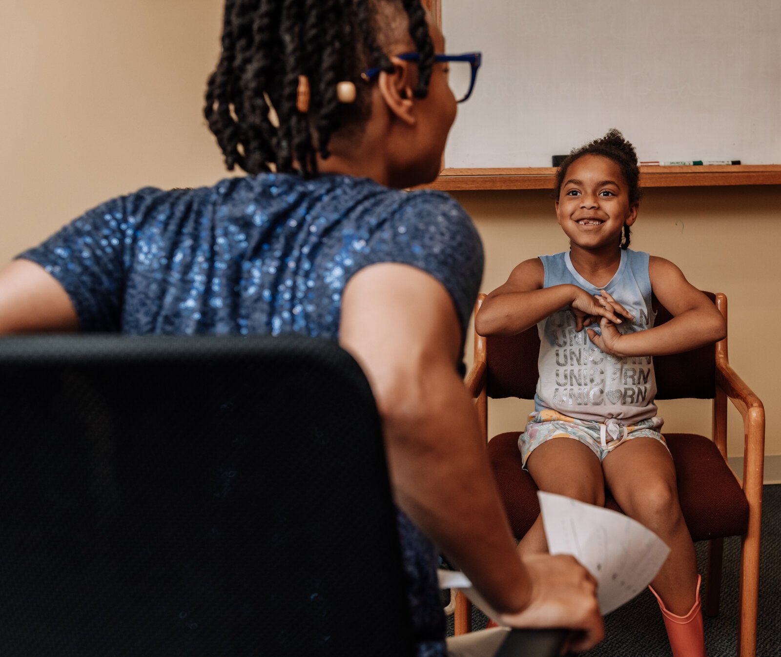 Alle Wims of Brain Geeks Learn educational services leads her students in a competitive counting game including student Ariyah during a private tutoring session at PENTA Center, 2513 S. Calhoun St.