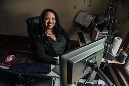 Adia Lewis, Founder and Owner of ALL Business Management Consulting, works from her home in Fort Wayne.
