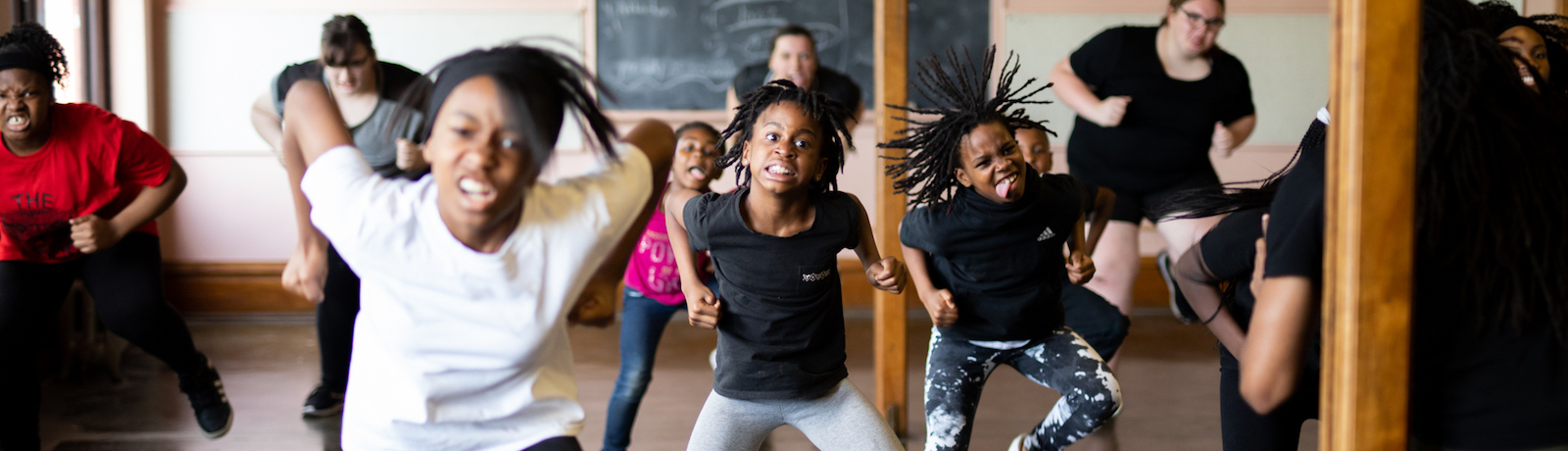 The Art Leadership Center in Fort Wayne practices a step routine at Faith United Methodist Church for their Juneteenth performance.