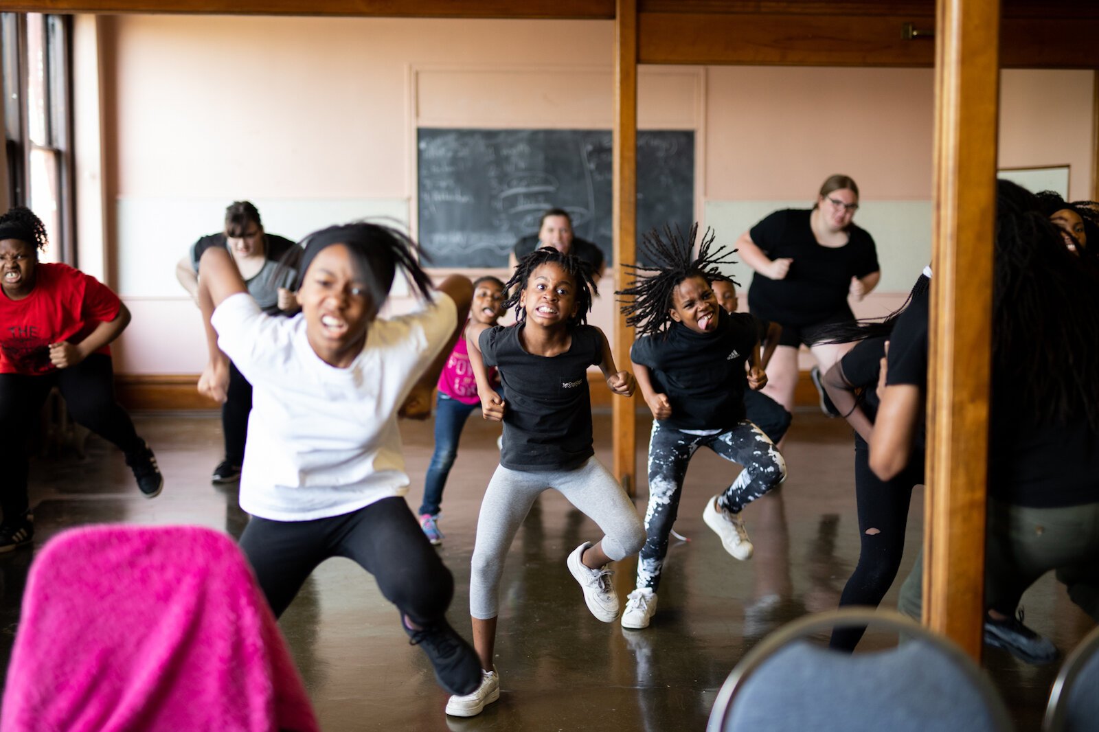 The Art Leadership Center in Fort Wayne practices a step routine at Faith United Methodist Church for their Juneteenth performance.