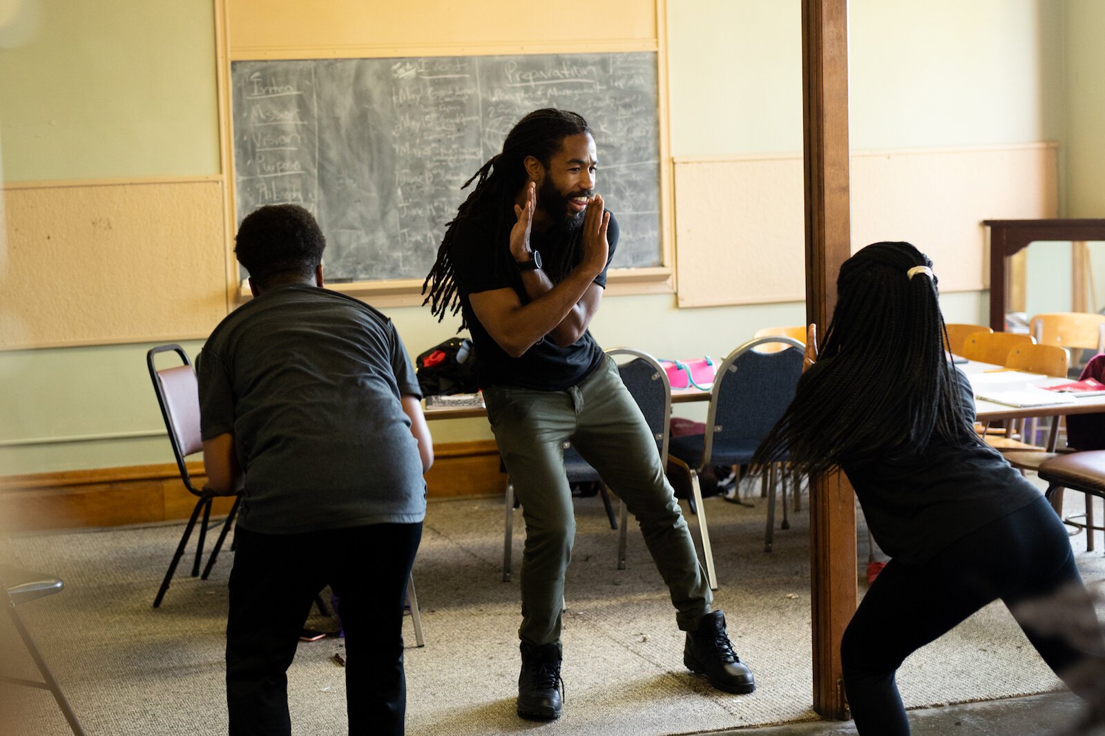 The Art Leadership Center in Fort Wayne practices a step routine at Faith United Methodist Church for their Juneteenth performance.