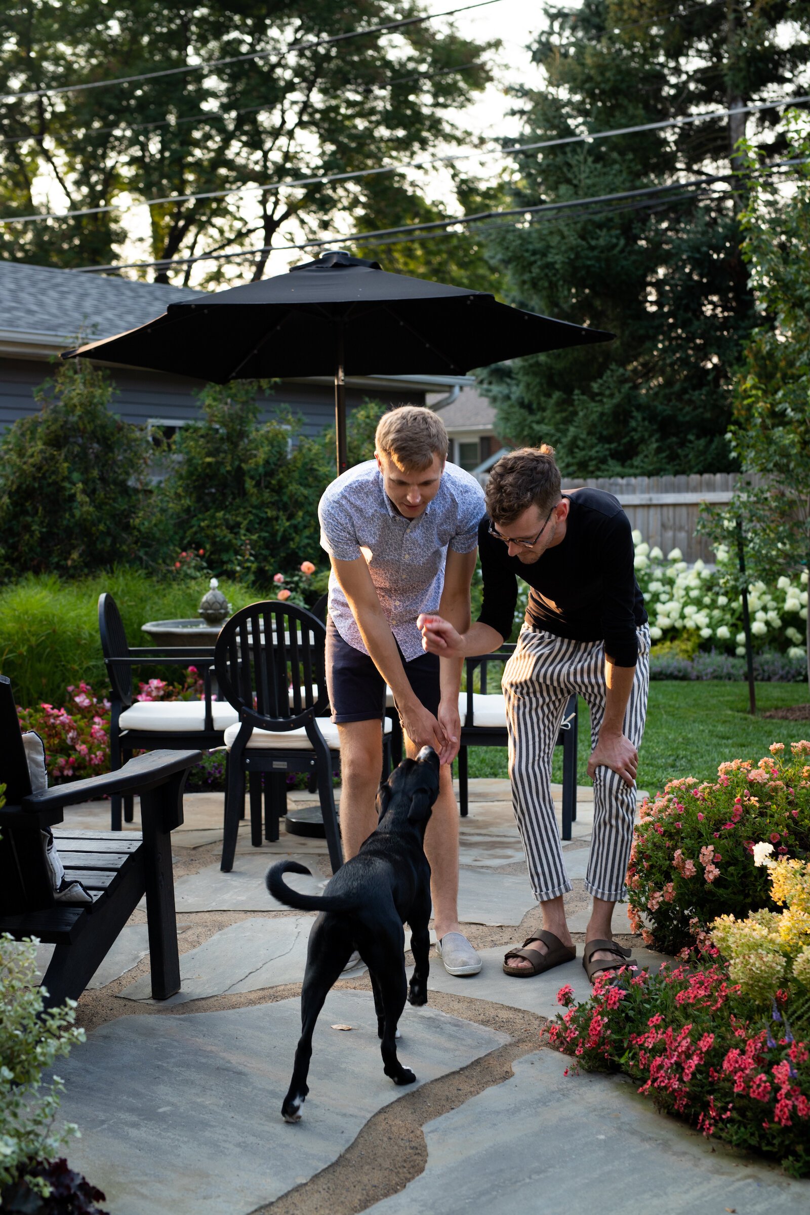 Husbands Kody Tinnel and Cory Allen with their adopted dog Miley.