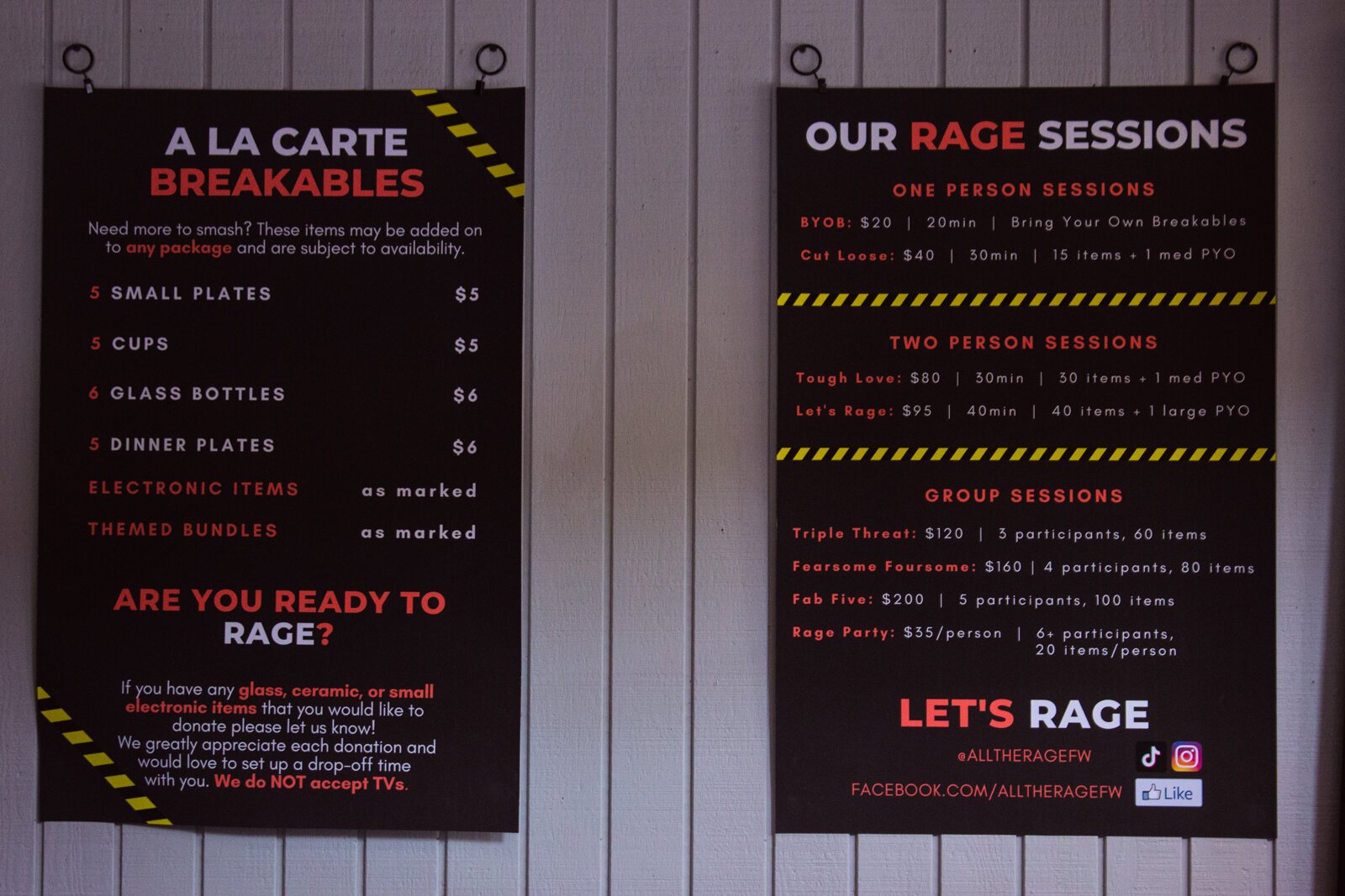 Signs displaying the different package options in the lobby of All the Rage.