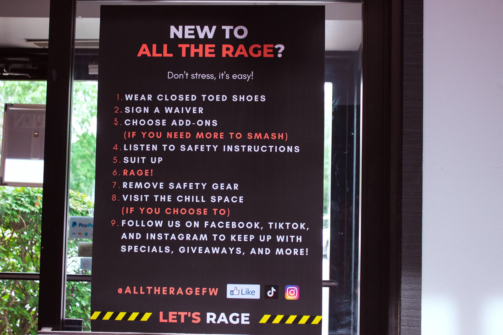 Safety information on display in the lobby of All the Rage.