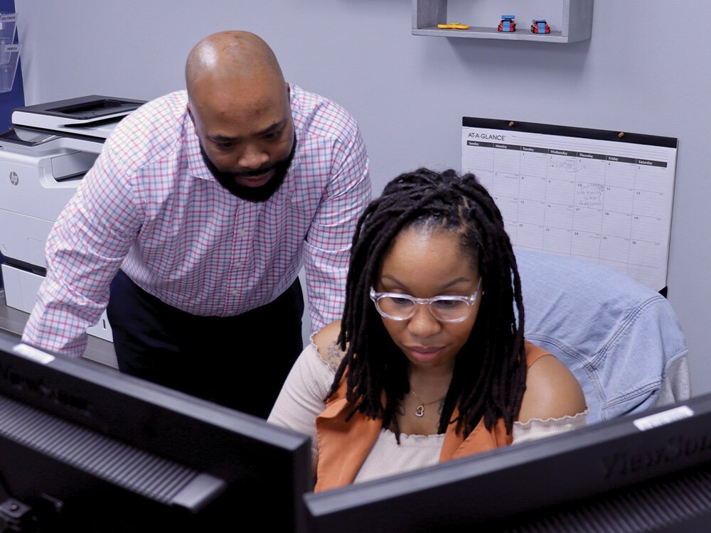 Matthew Booker and Evelyn Booker work together on an insurance account.