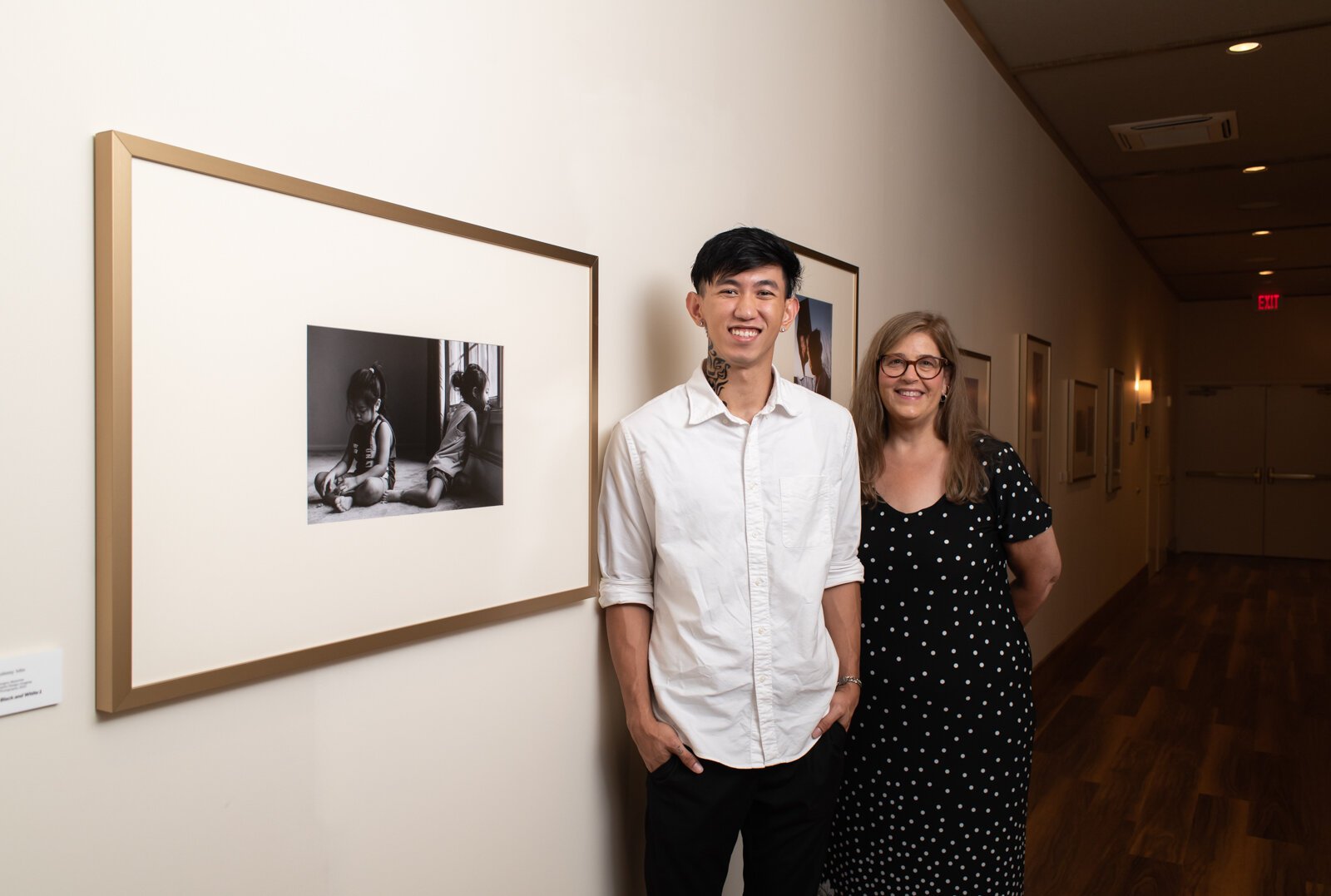 PFW Professor Rebecca Coffman and recent PFW graduate and artist Johnny Min in the new revolving gallery featuring work from Purdue Fort Wayne students, alumni and faculty at The Bradley, 204 W. Main St.