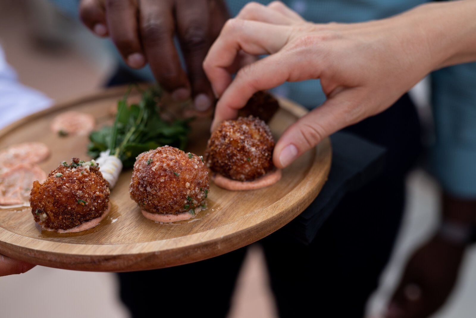 Fried Mac n' Cheese balls are served at Birdie's Rooftop Bar at The Bradley at 204 W. Main St.