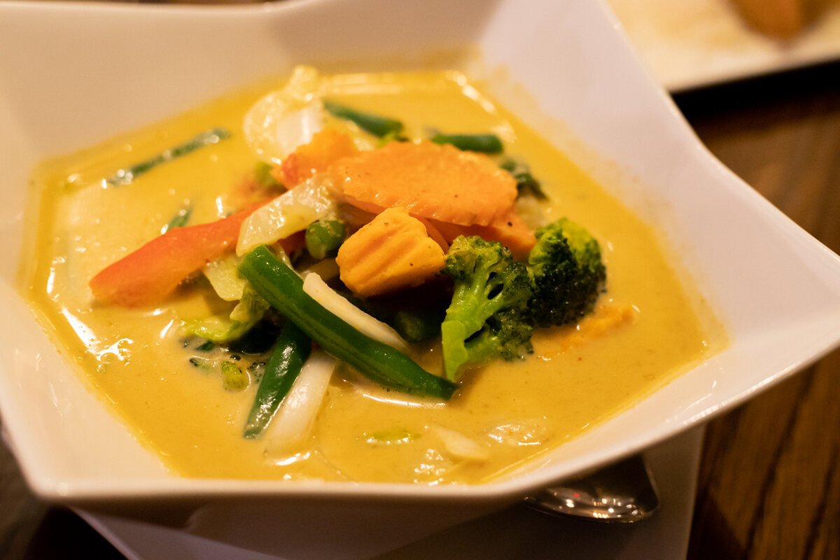 The yellow curry (kaeng ka ree) is sweet, silky, and full of comforting spices that coat your mouth.