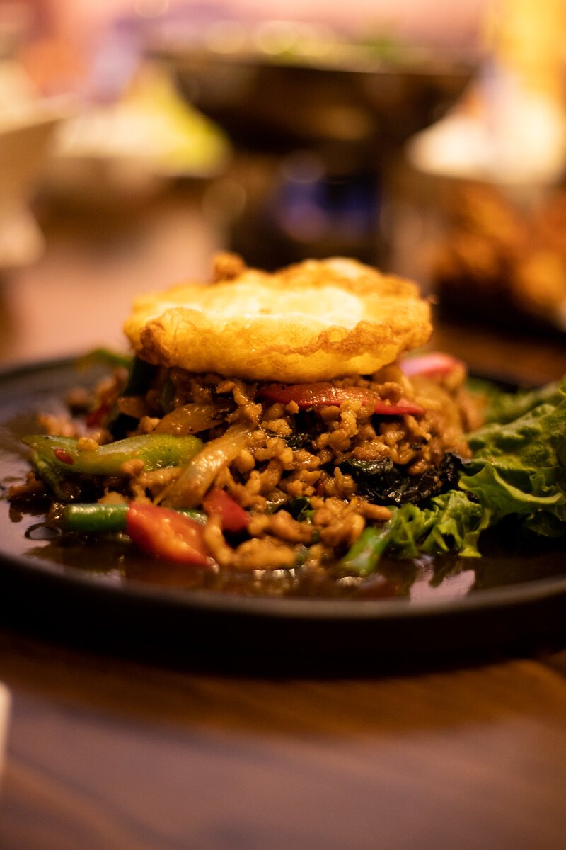 The Main Street Basil Stir-Fry (Pad Kra Prao Minced Meat) is a minced pork stir-fry coated in a sweet, umami-rich sauce that’s infused with anise-y Thai basil.