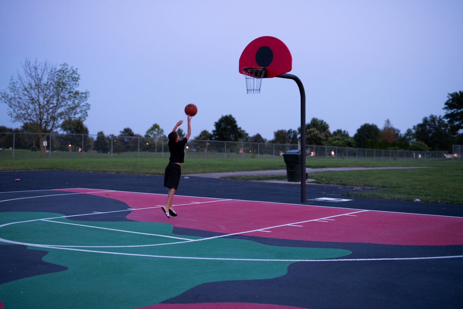 Painted basketball courts at McMillen Park courtesy of AbsorbAll.