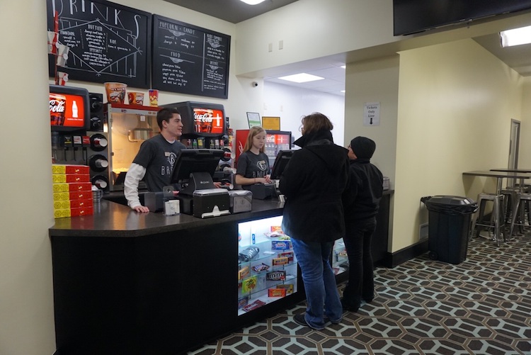 Patrons enjoy the concession stand at the Brokaw Theatre.