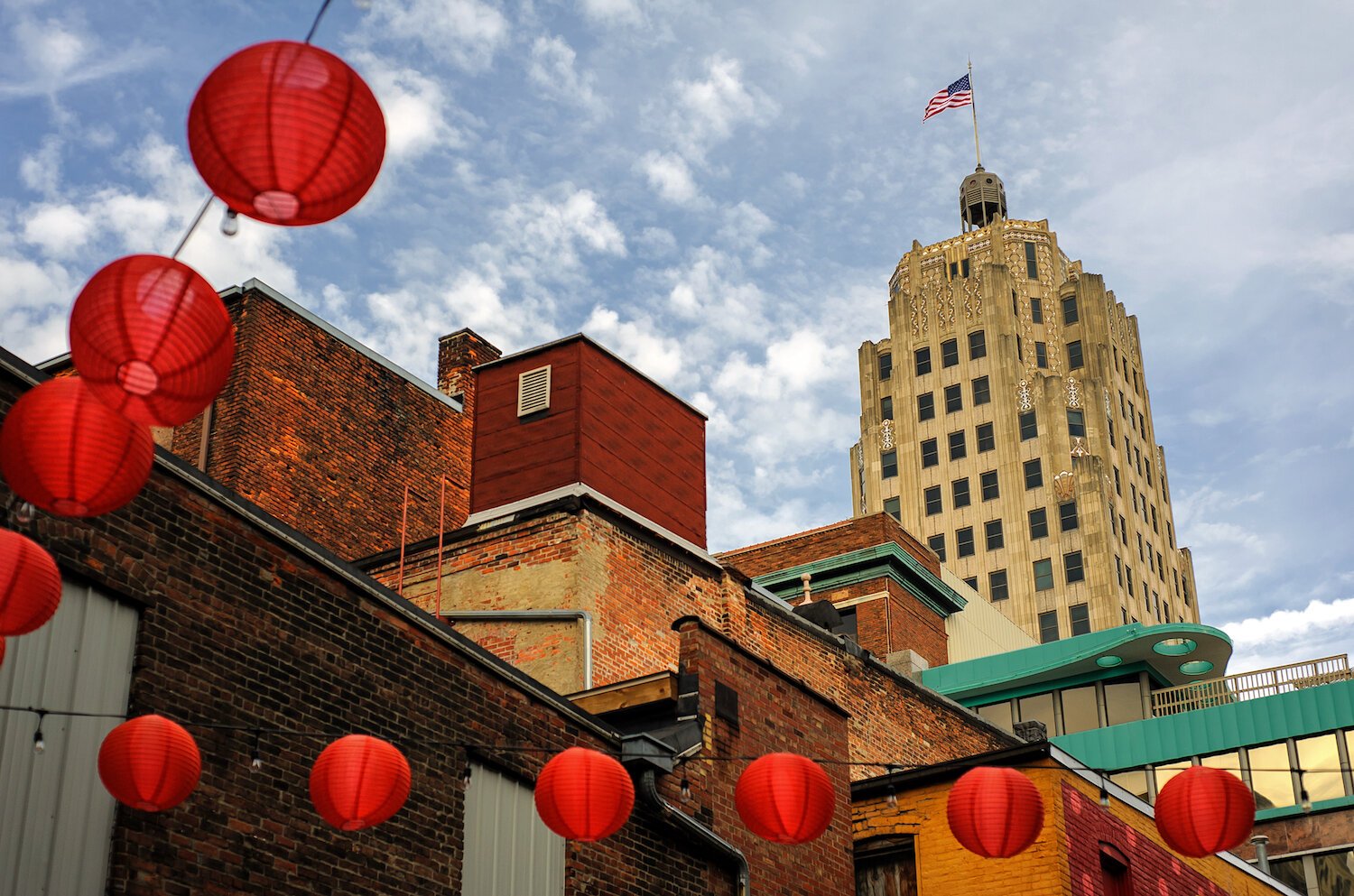 Hanging lanterns decorate the alley next to 816 Pint & Slice in downtown Fort Wayne.