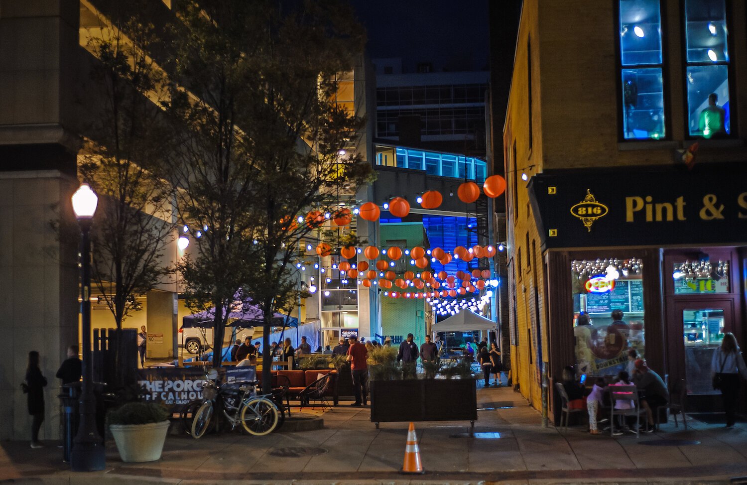 The Porch Off Calhoun is in the alley adjacent to 816 Pint & Slice.