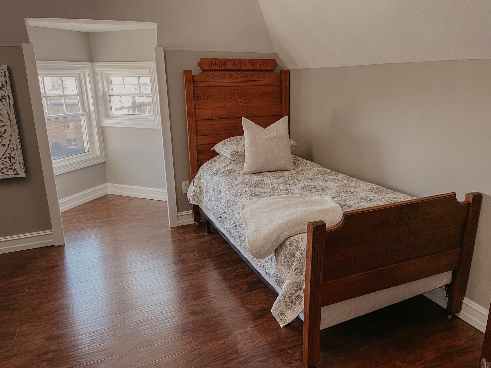 A cozy bedroom with an alcove at the Clarkson House.