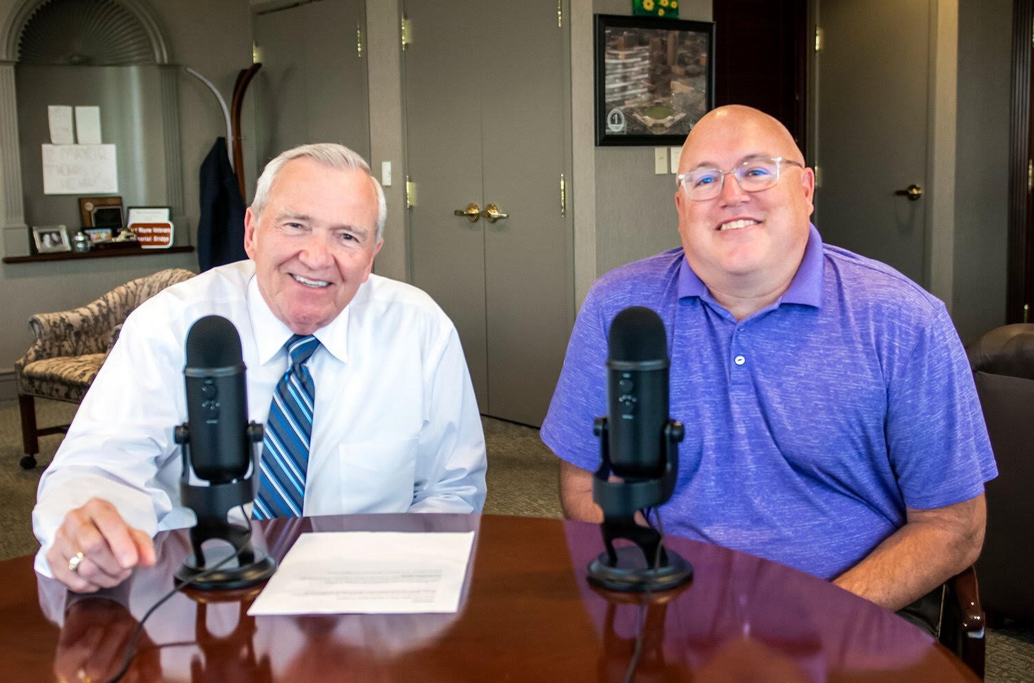 Brightpoint President/CEO Steve Hoffman, right, was on the podcast of Mayor Tom Henry, left, earlier this year to discuss the agency’s impactful work.