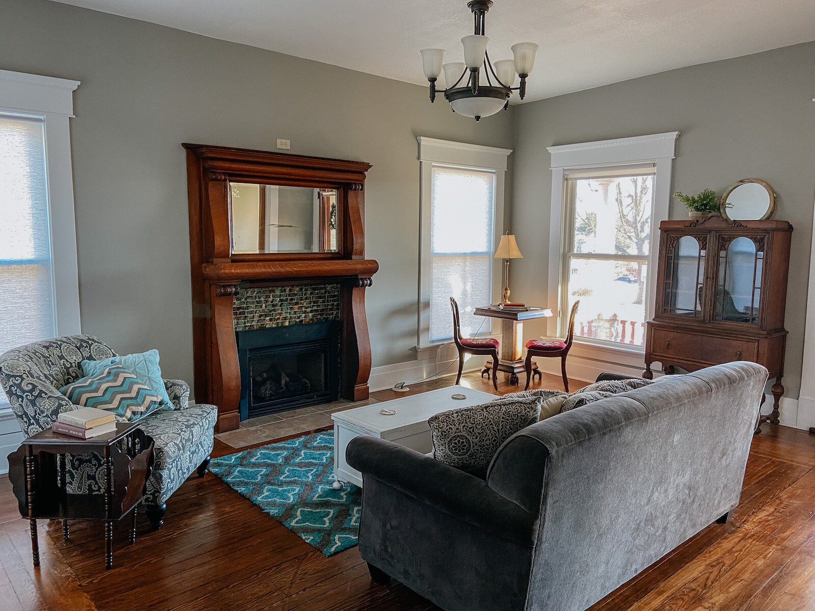 The living room at the Clarkson House has a fireplace.